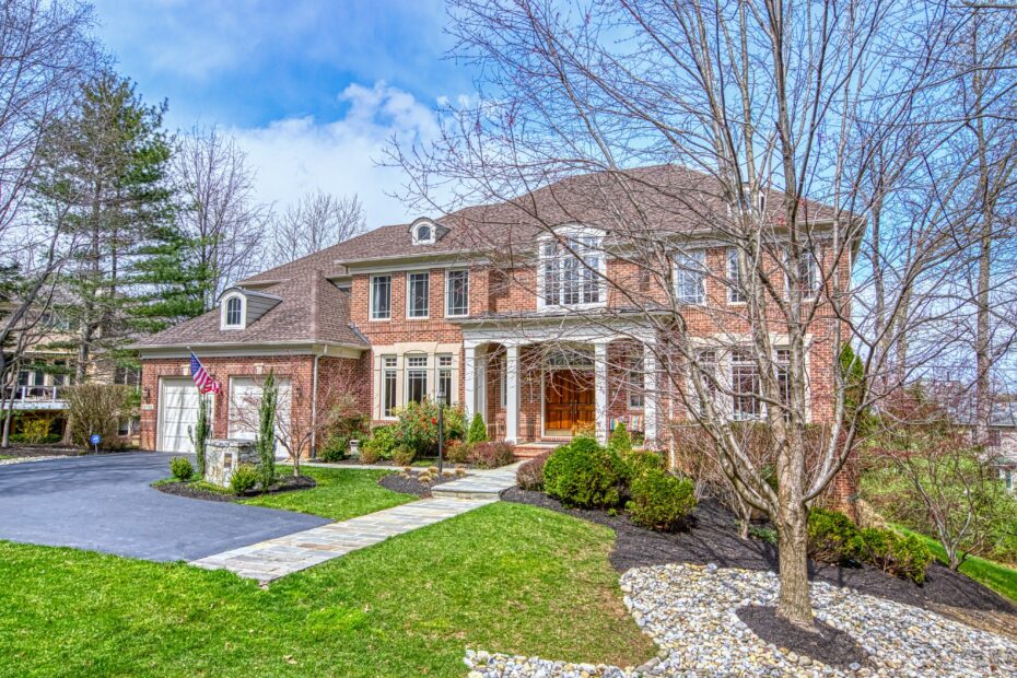 all brick impressive home, shot on an angle in Reston, Virginia