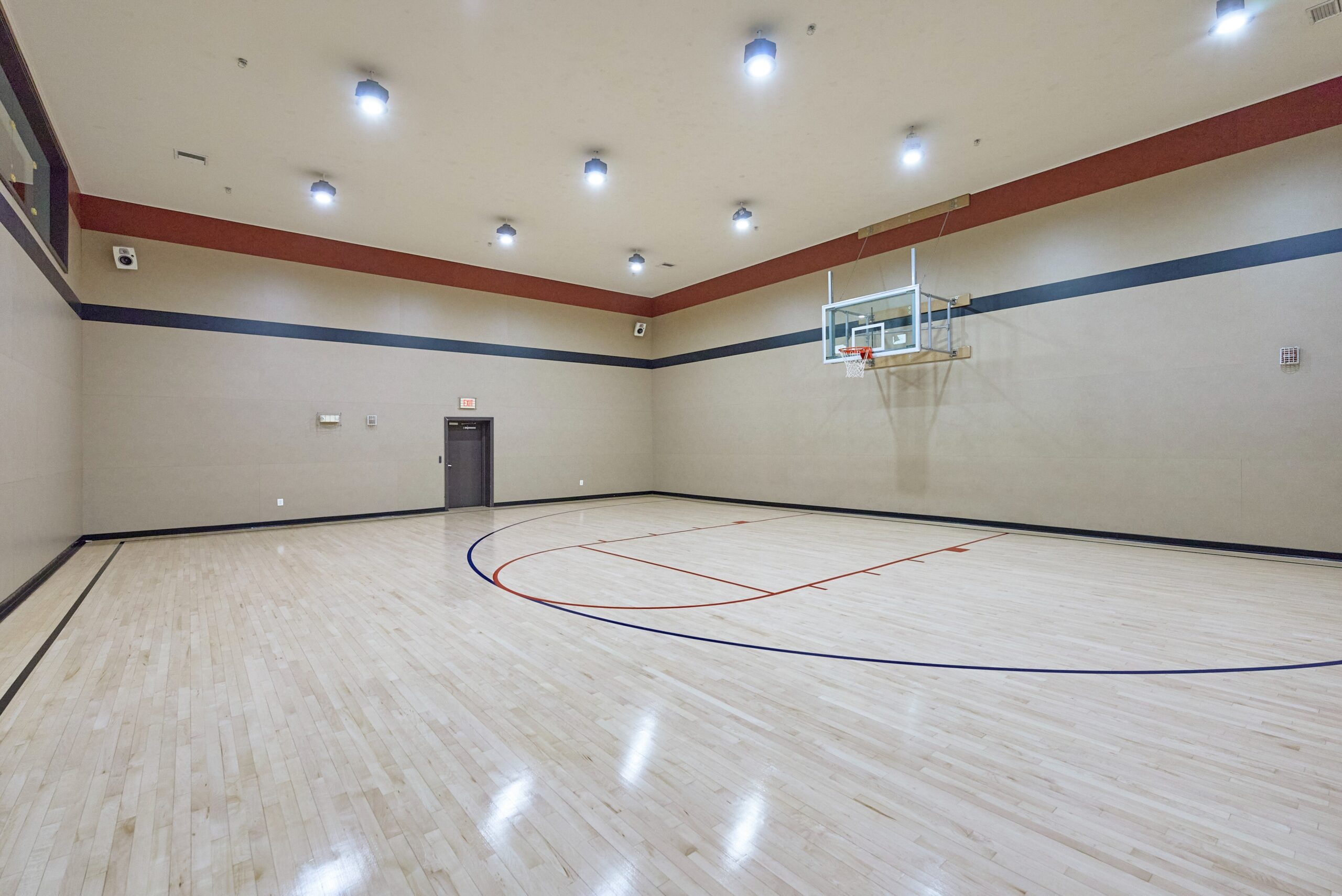 Large indoor basketball court in condo building
