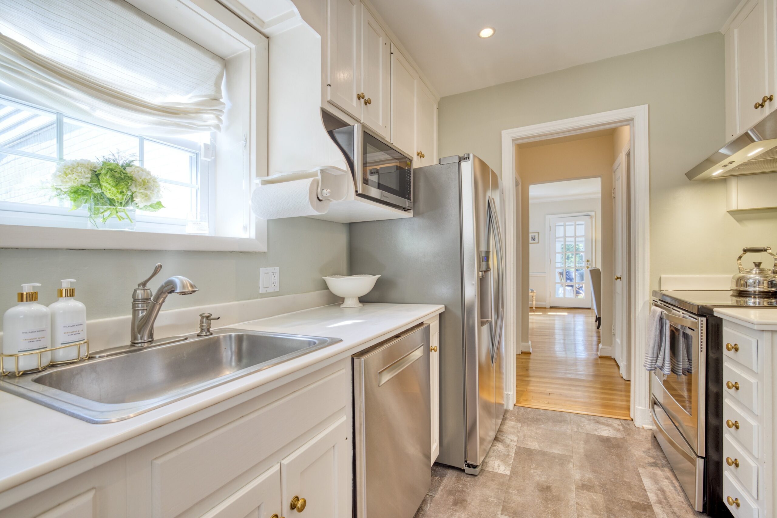Interior professional photo of kitchen of 1946 Cape Cod home in Alexandria, VA with minimal staging