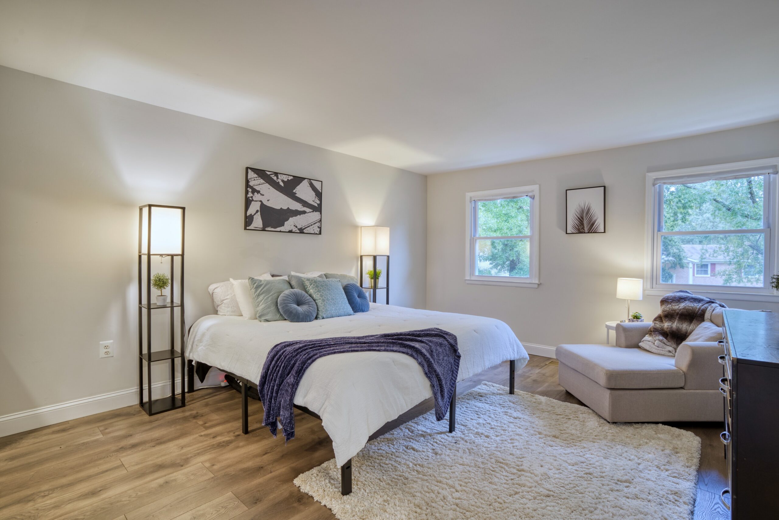 Interior professional photo of 9015 Longbow Rd - showing master bedroom with modern staging