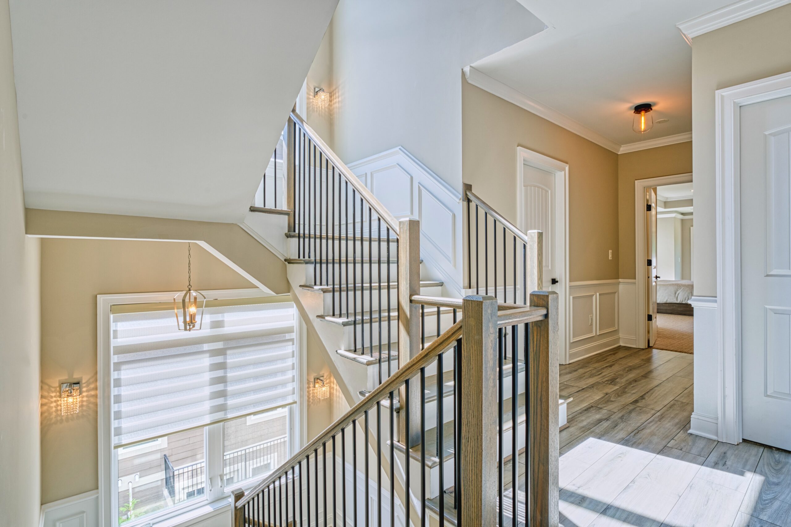professional Fusion photo of the interior of a home in McLean, VA - showing stair case leading down as well as up.