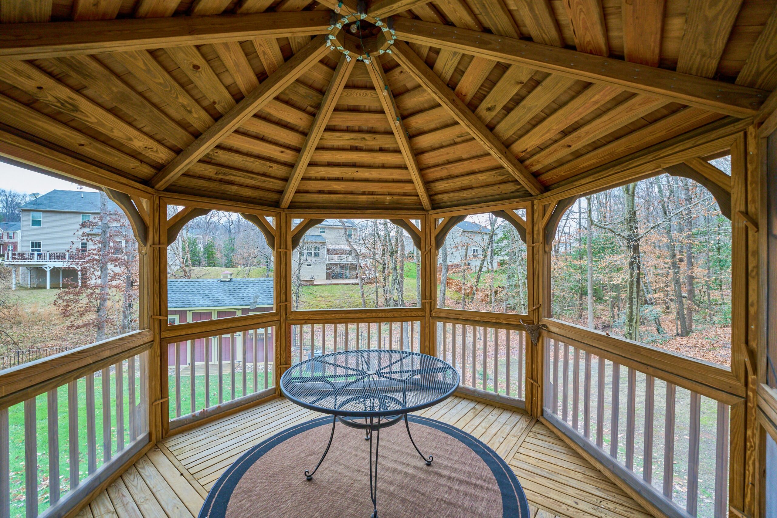Professional exterior photo of 80 Brentsmill Drive in Stafford, Virginia - showing the interior of the screened gazebo