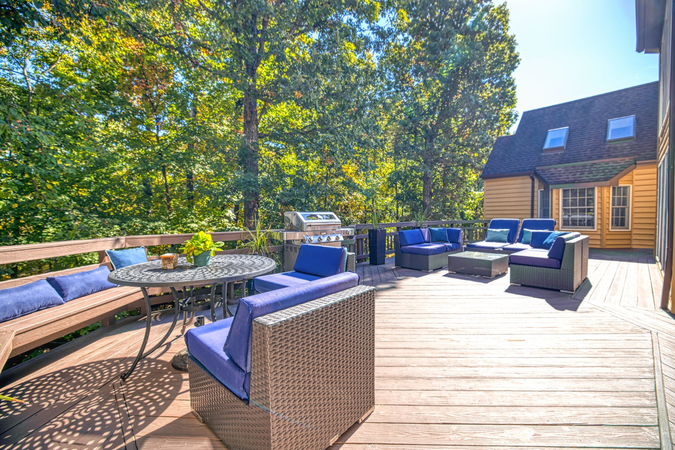 exterior photo of 21024 Starflower Way in Ashburn, VA - showing the rear deck from one end with various deck furniture