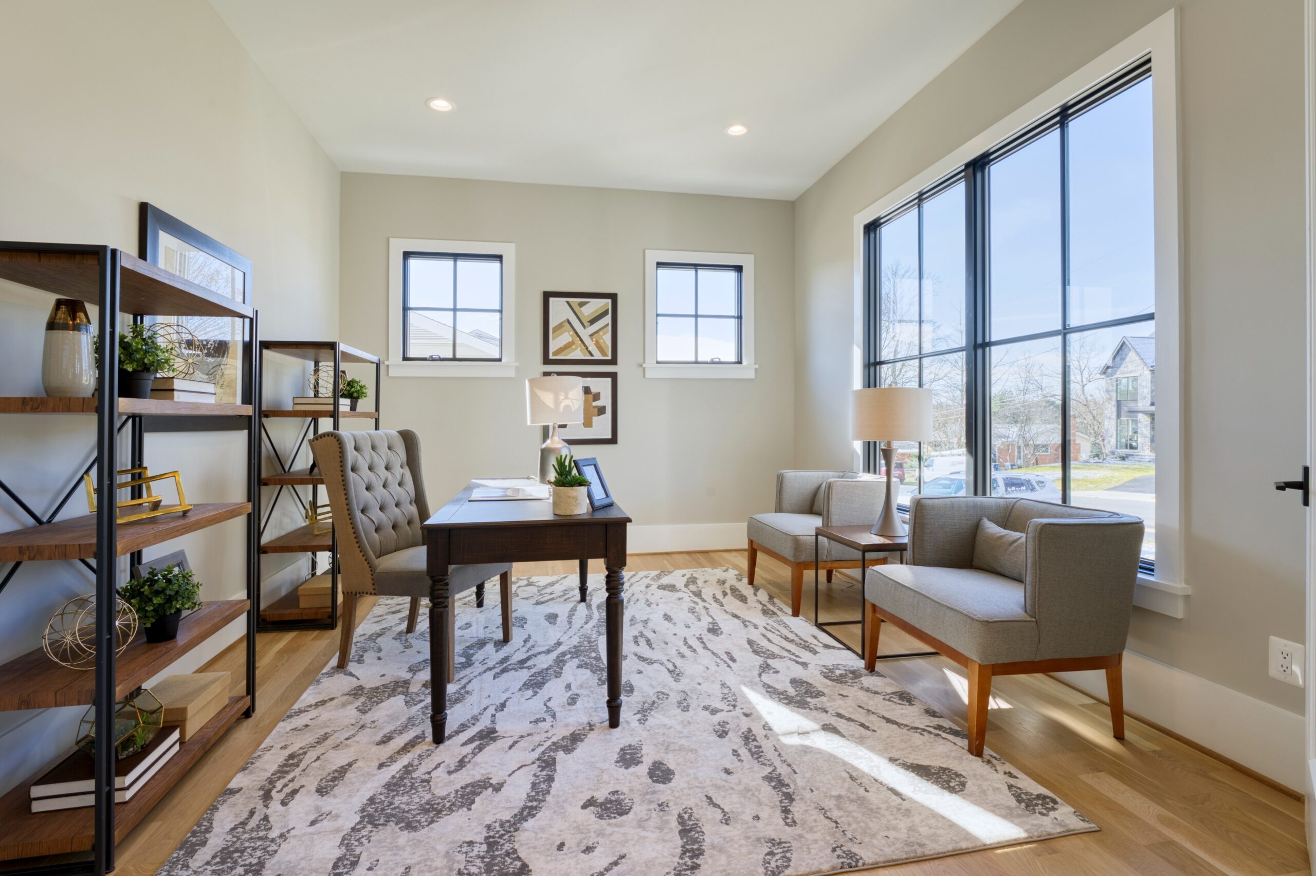 Professional interior photo of 1624 Dempsey St, McLean, VA - showing an office space with hardwood floors and lots of natural light from large windows