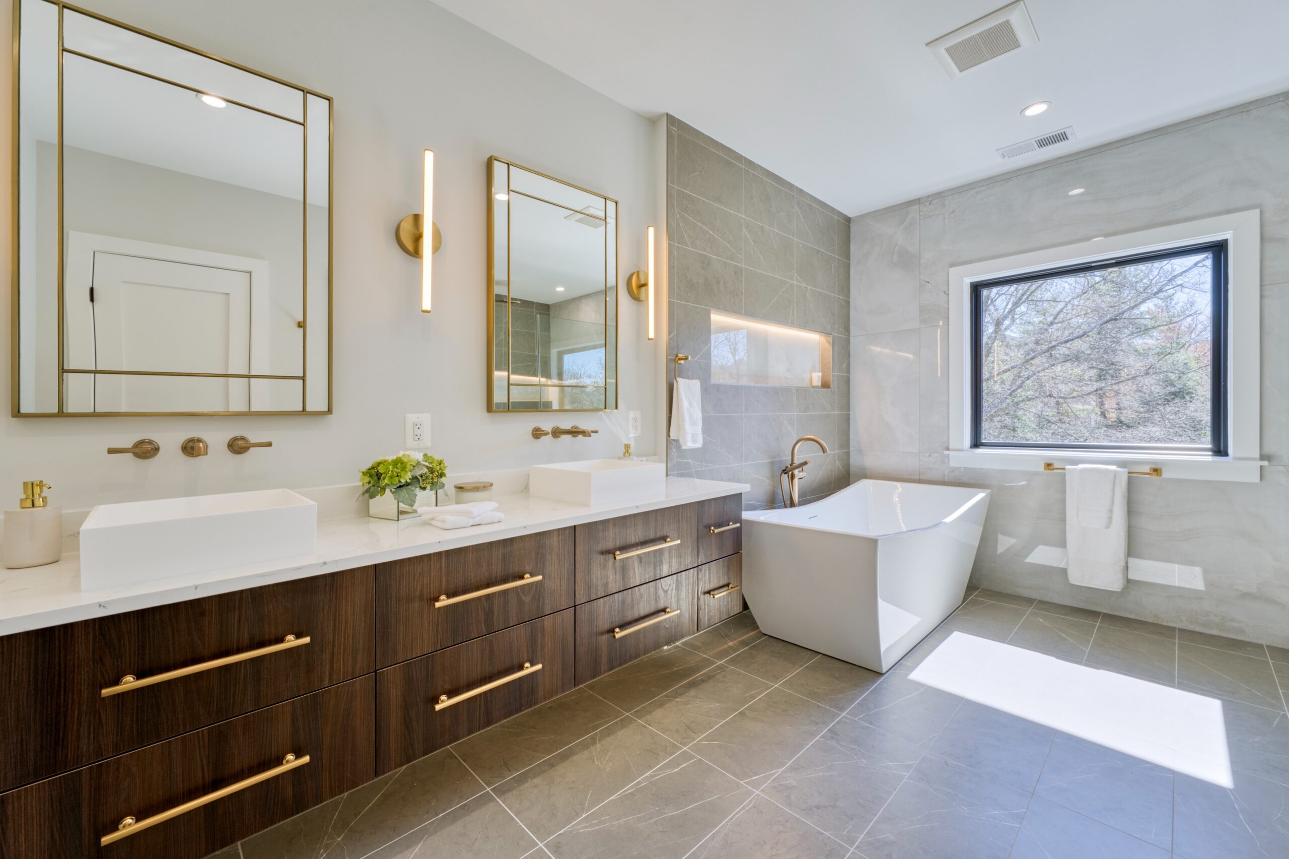 Professional interior photo of Custom New Home 1416 S Greenbrier St - showing the primary bathroom with designer dual vanities and soaking tub