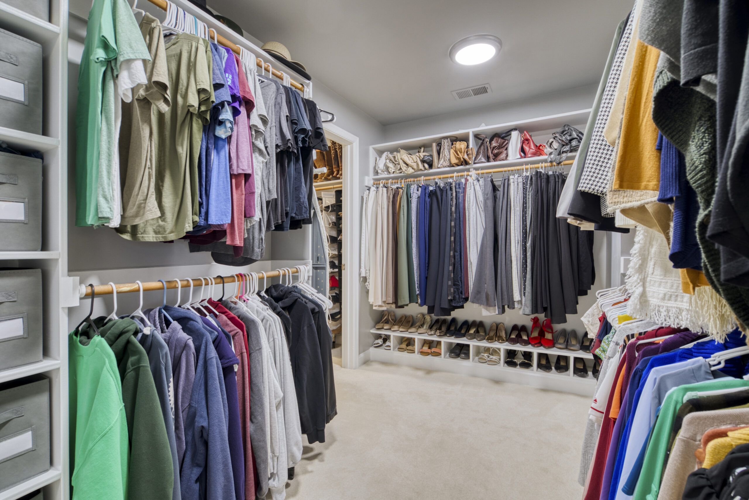 Professional interior photo of 9701 Chilcott Manor Way - showing ONE of the primary closets