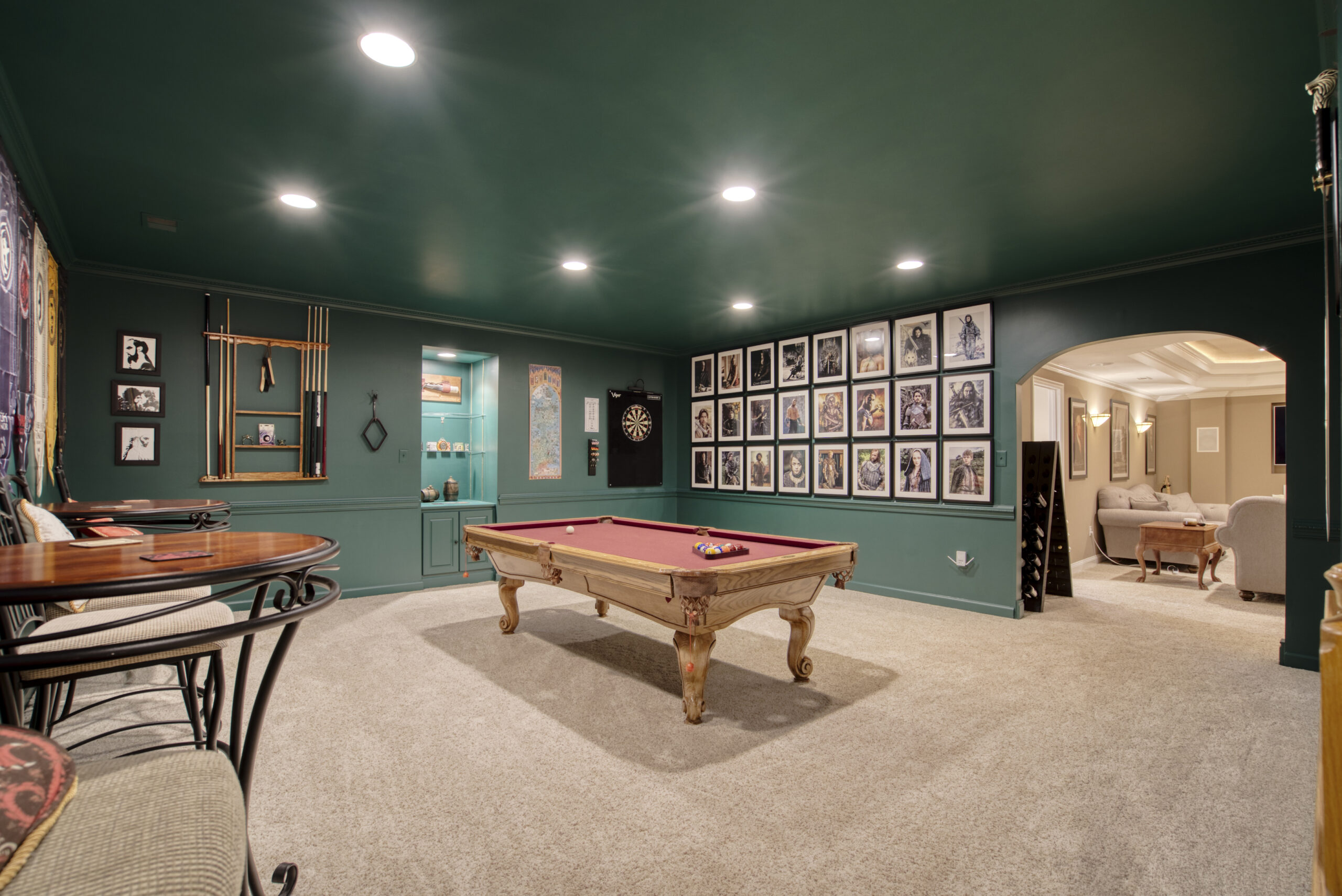 Professional interior photo of 9701 Chilcott Manor Way - showing a billiards room in the basement