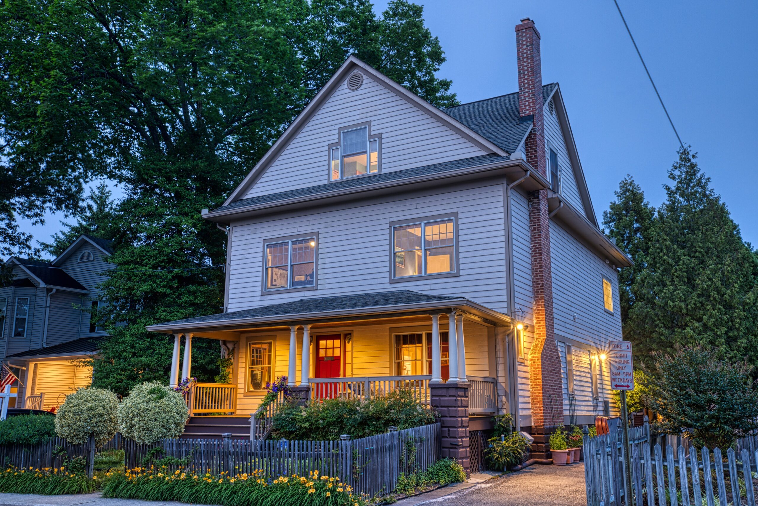 Professional exterior photo taken at dusk of 819 N Fillmore St - Showing the front of the home at the right angle