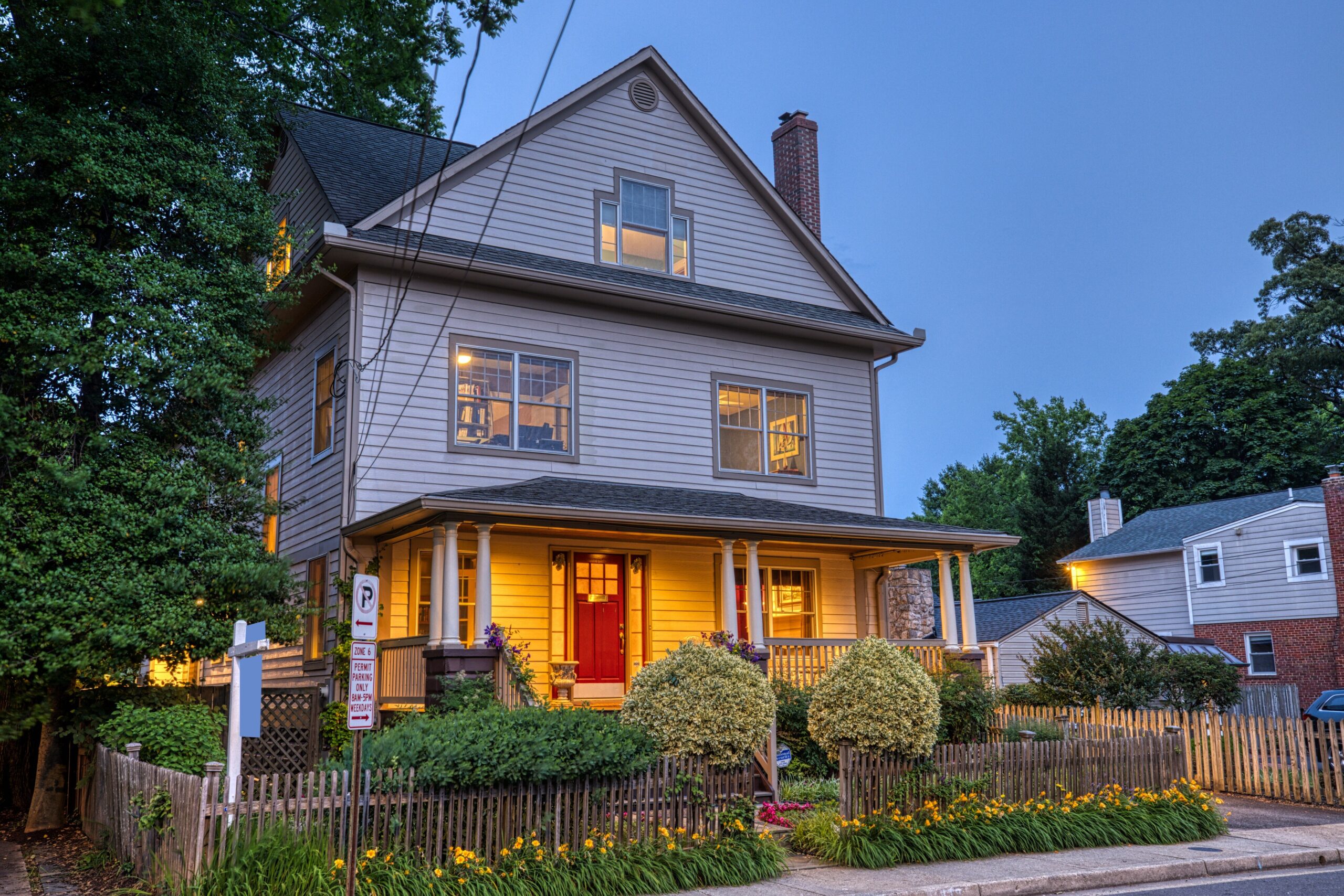 Professional exterior photo taken at dusk of 819 N Fillmore St - Showing the front of the home at the left angle