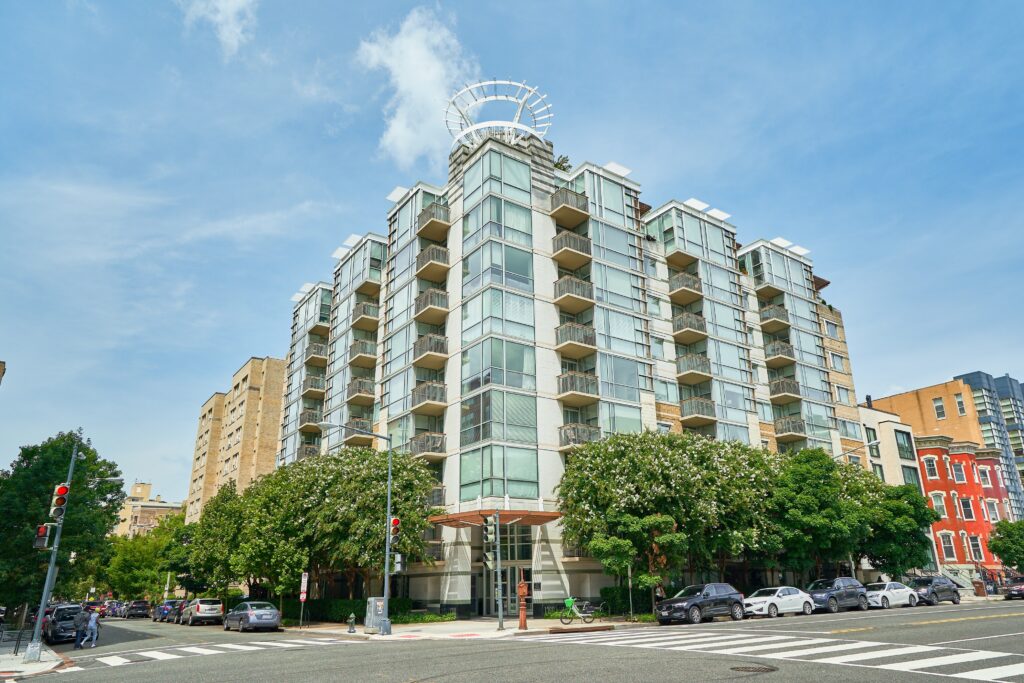 Professional exterior photo of 1300 13th St NW, Washington DC - showing the front corner view