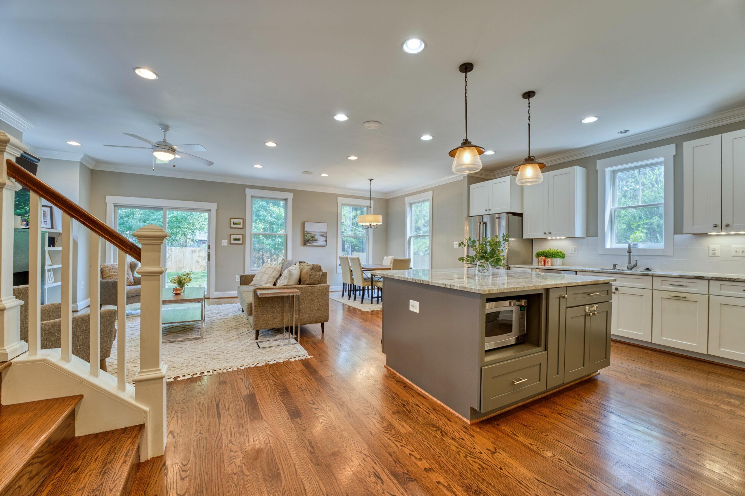 Professional interior photo of 505 N West St - showing the view from the front door with kitchen flowing into family room