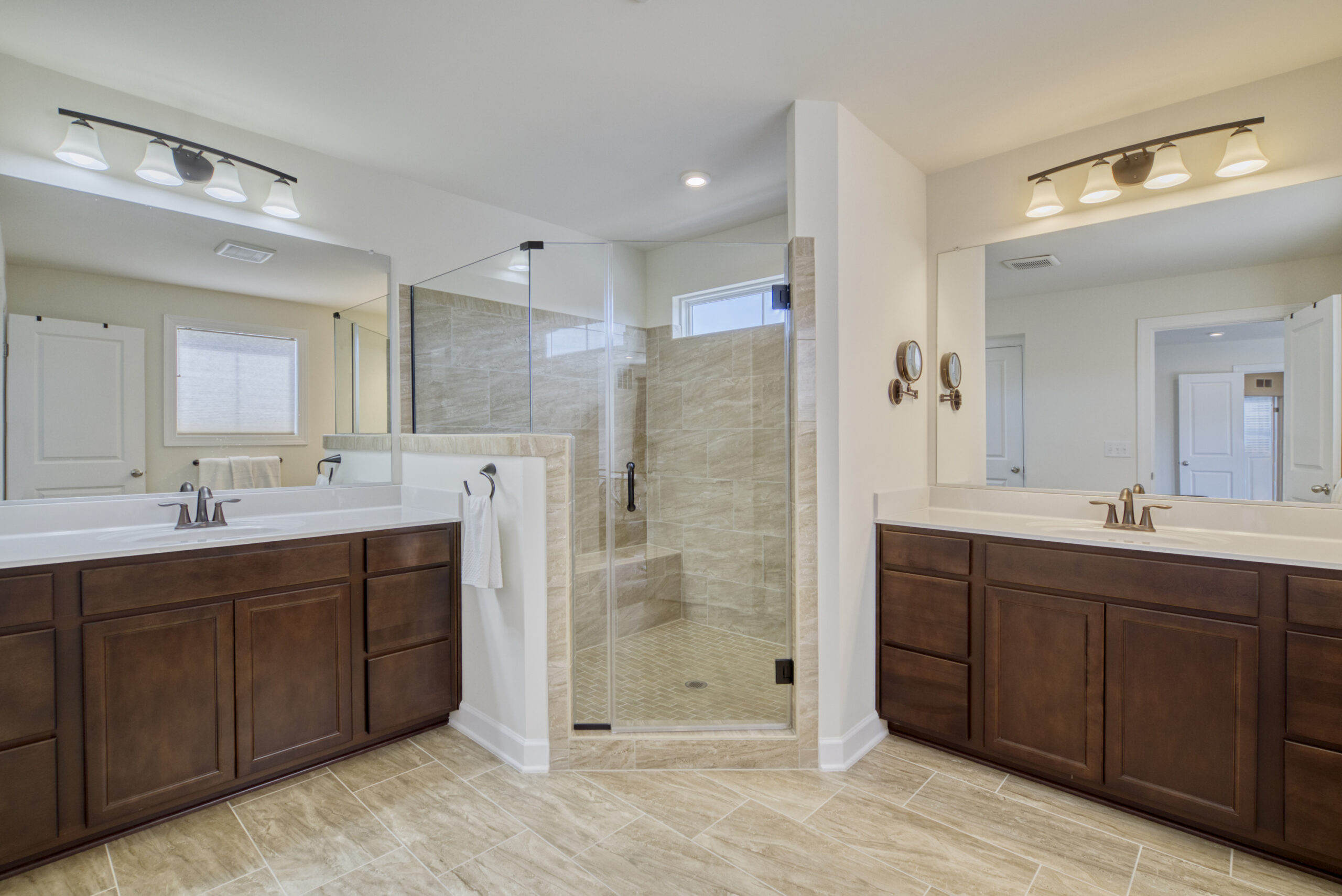 Professional interior photo of 8109 Zoe Place, Alexandria, VA - Showing the primary bathroom with large shower with shower bench