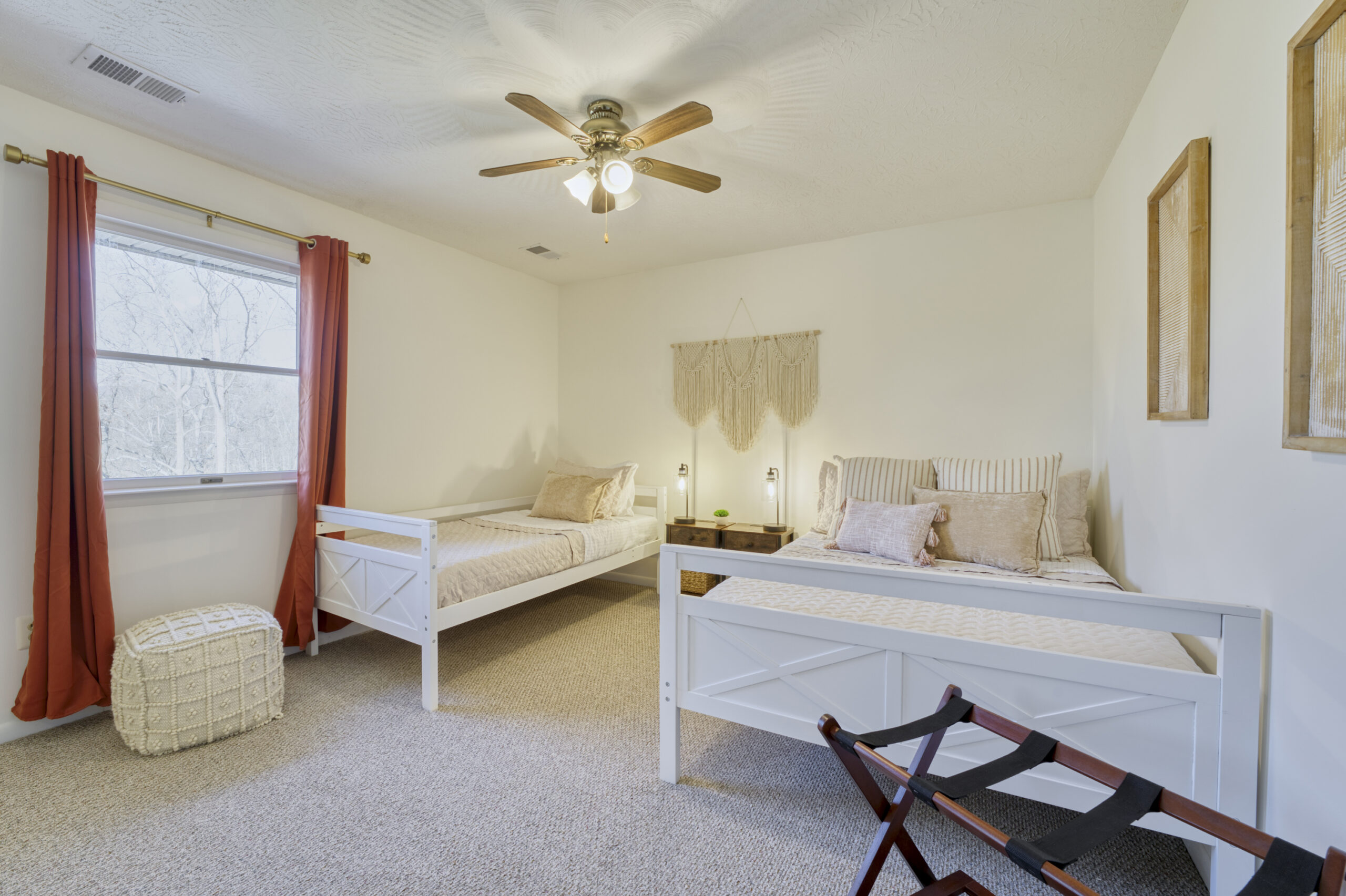 Professional interior photo of 4809 Grove Hill River Rd - showing one of the bedrooms with ceiling fan, double bed and single bed
