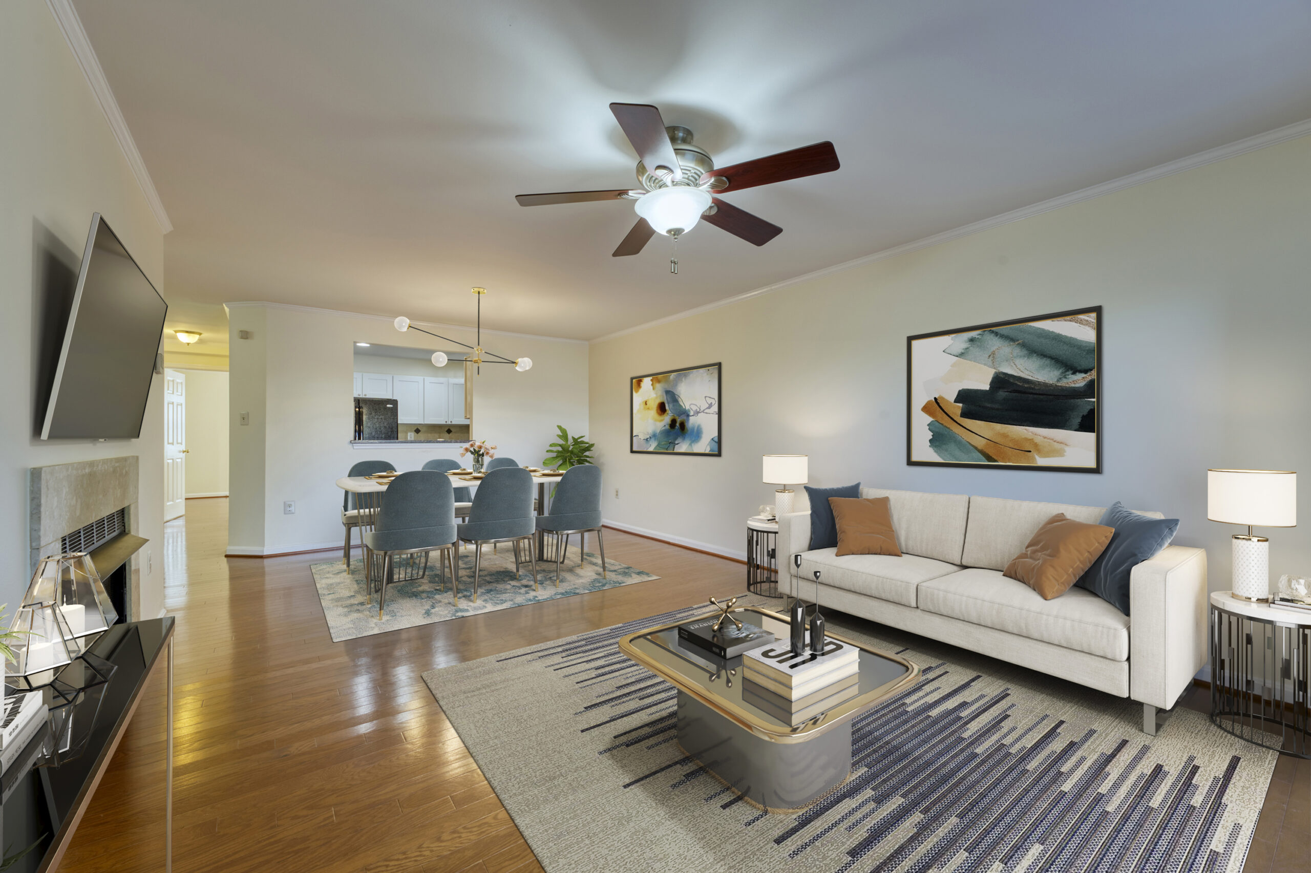 Professional interior photo of 20588 Cornstalk Ter Unit 101 - Showing the living room with hardwood floors, which has been virtually staged